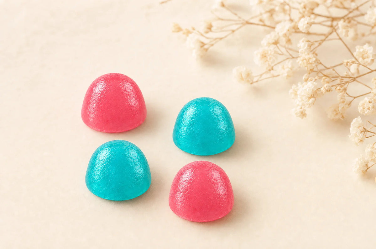 Gomitas de creatina Fills sobre fondo crema
